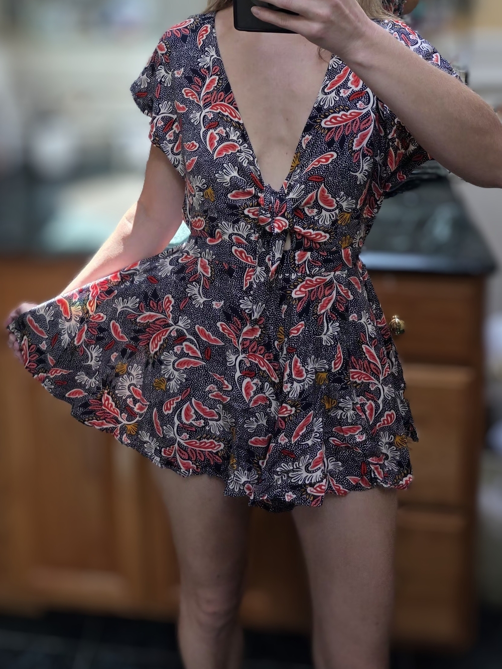 Lulu's Navy Floral Deep-V Tie-Waist Romper with Red & Mustard Accents